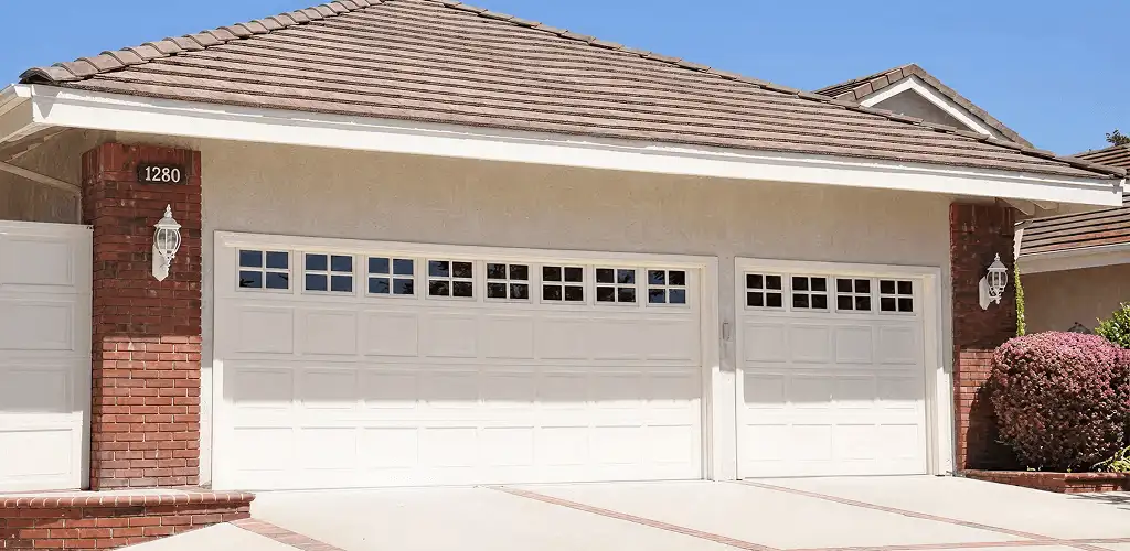 Residential garage door repair service for a double garage door in St Paul, MN
