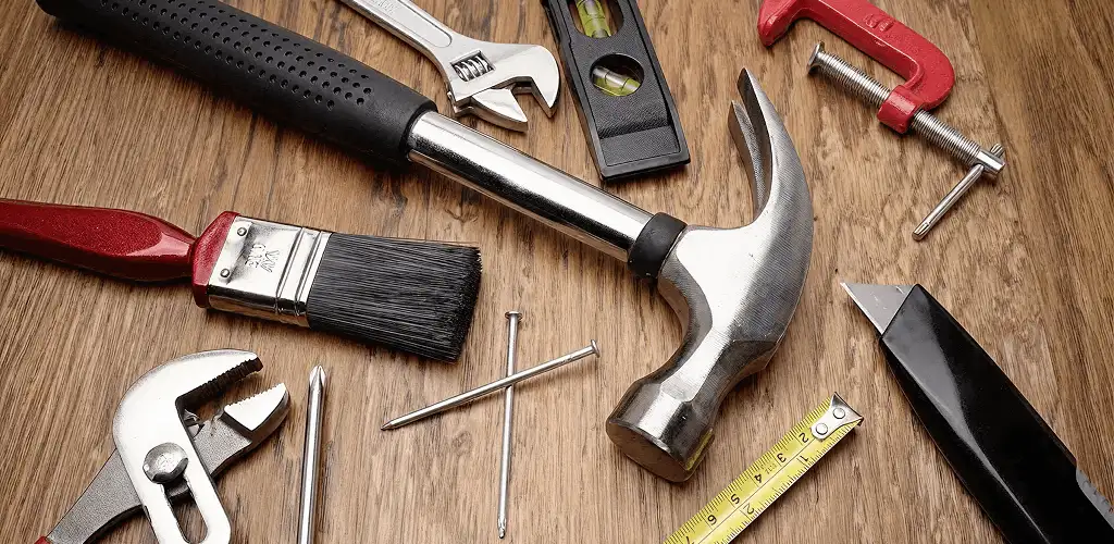 Handyman tools laid out for home repair and maintenance work in St Paul, MN