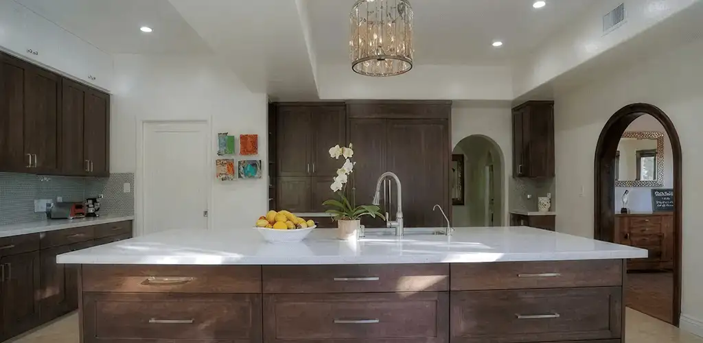 Cabinet refacing project with updated kitchen cabinets and island in St Paul, MN